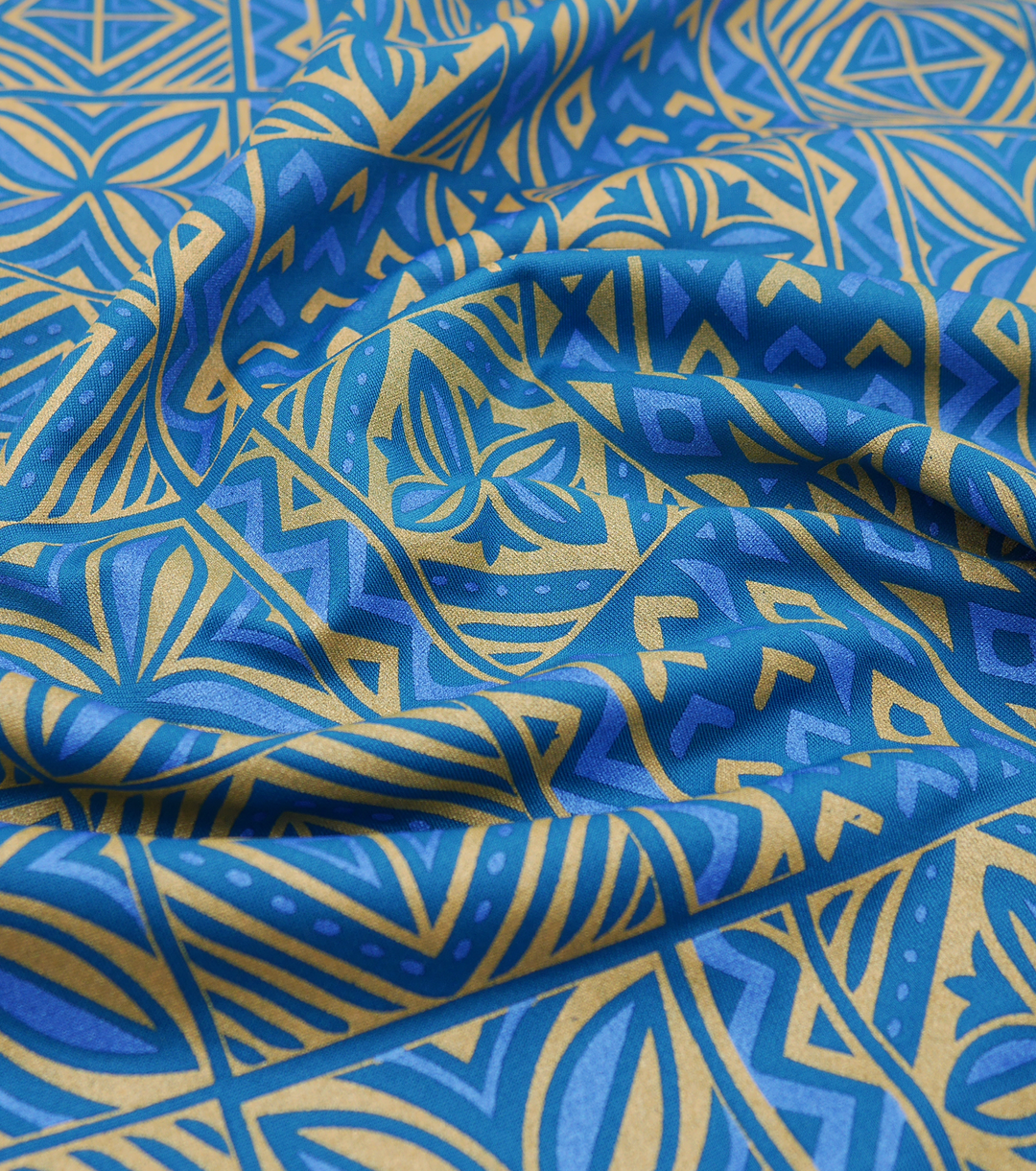 Stretch Polyester Pacific Print $12.00p/m Design #20 - Blue & Gold