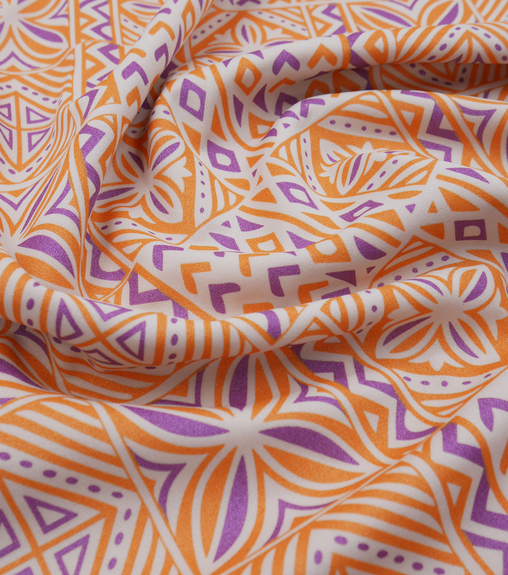 Stretch Polyester Pacific Print $12.00p/m Design #22 - Cream, Purple & Gold