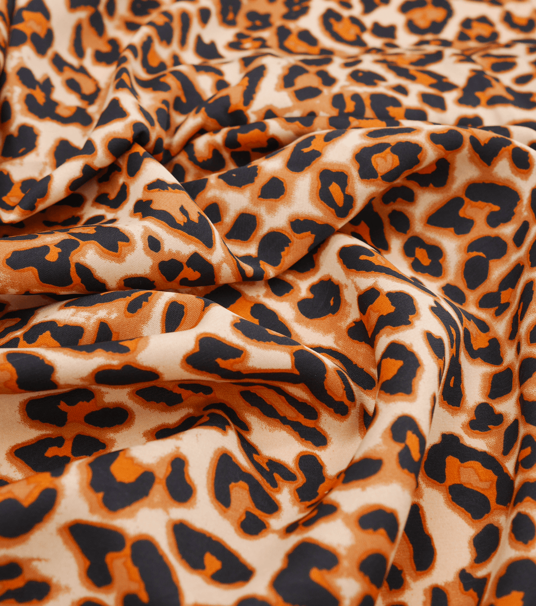 PRINTED POLYESTER $5.00P/M - Wild Ember Leopard - The Fabric Shop