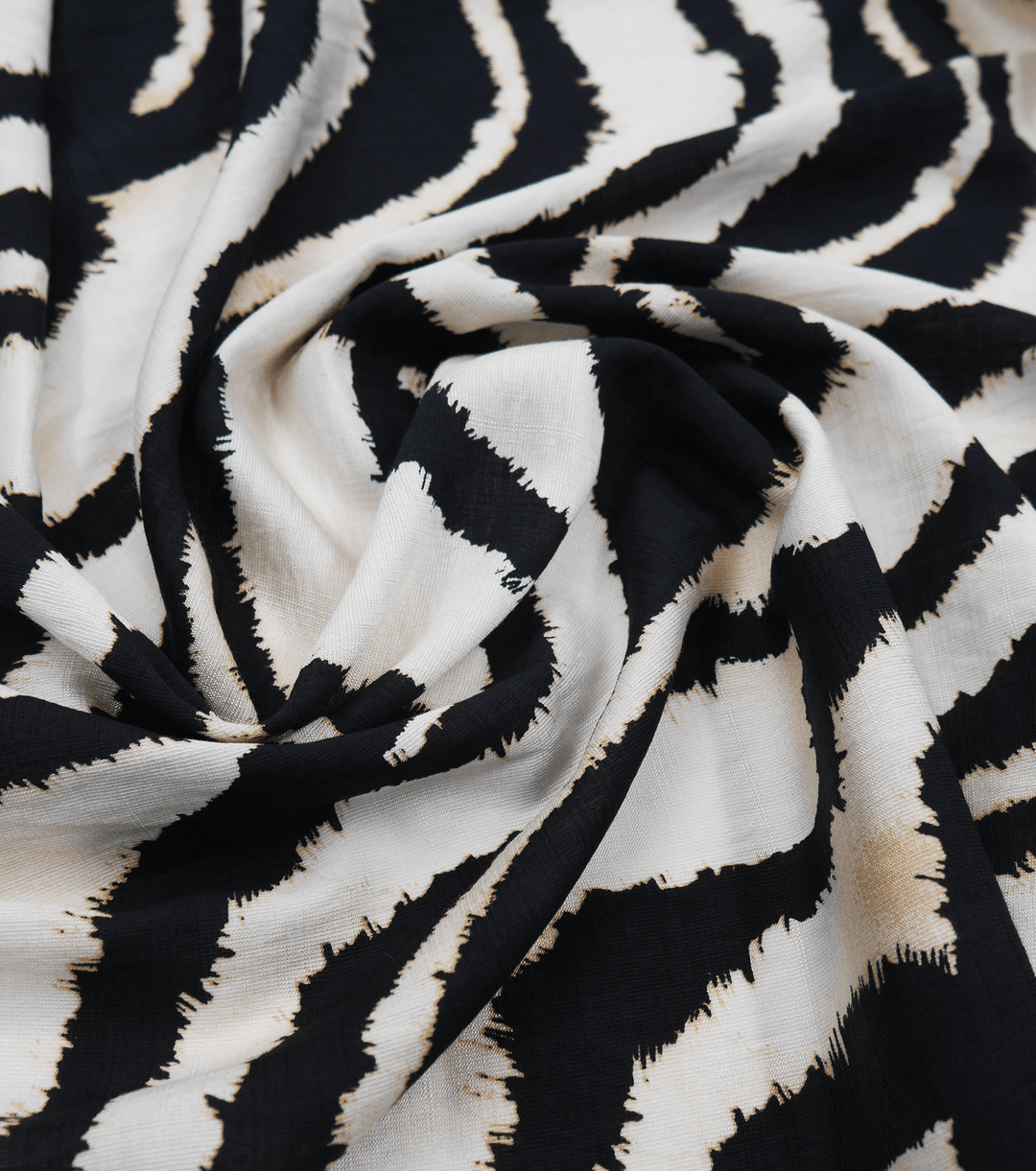 PRINTED RAYON/BAMBOO $16.00 P/M - Ivory Zebra - The Fabric Shop