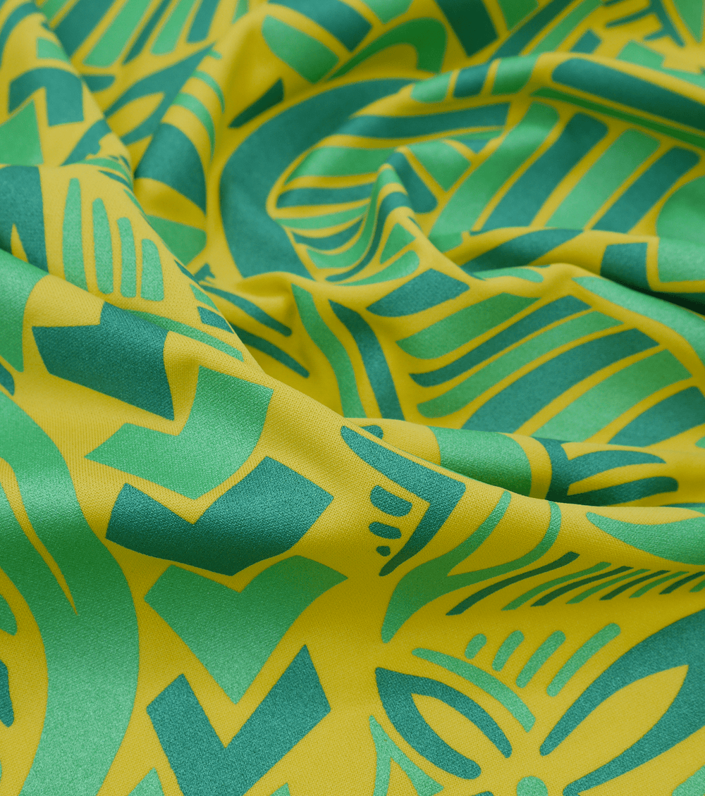 STRETCH POLYESTER PACIFIC PRINT $12.00P/M - The Fabric Shop