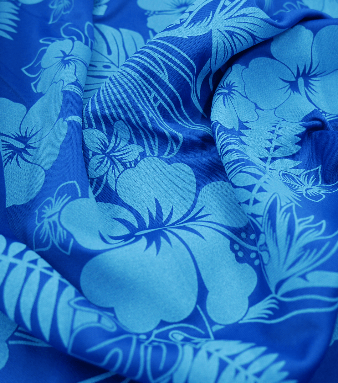 STRETCH POLYESTER PACIFIC PRINT $12.00P/M - The Fabric Shop