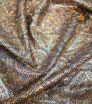 Holographic 4 Way Stretch Fabric $25.00p/m - Aretha