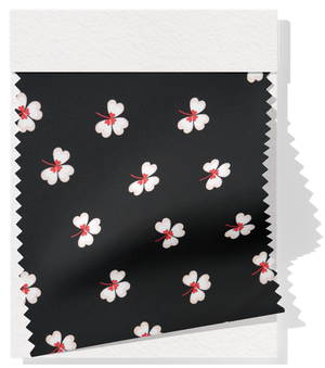 Printed Polyester $10.00p/m - Black w/ white flower  (Online Only)