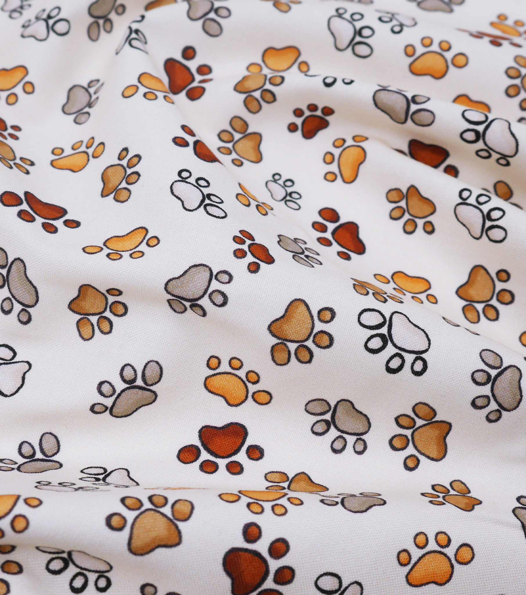 Craft Cotton $10.00p/m Dog Paws - White, Brown & Yellow