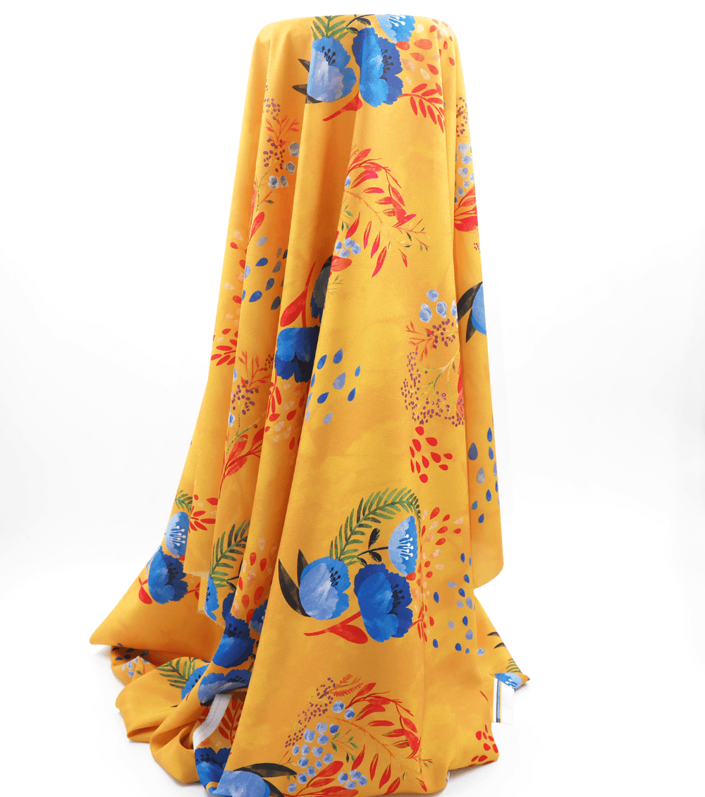 Printed Polyester $5.00p/m - Gold w/ blue flower (Online Only) - The Fabric Shop